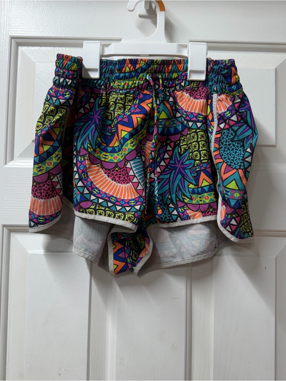 Vibrant Multicolor Printed Athletic Shorts has some flaws
